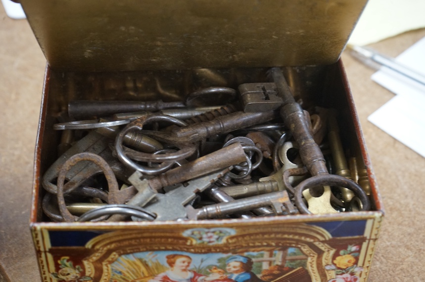 A box of assorted 19th century and later clock keys. Condition - fair